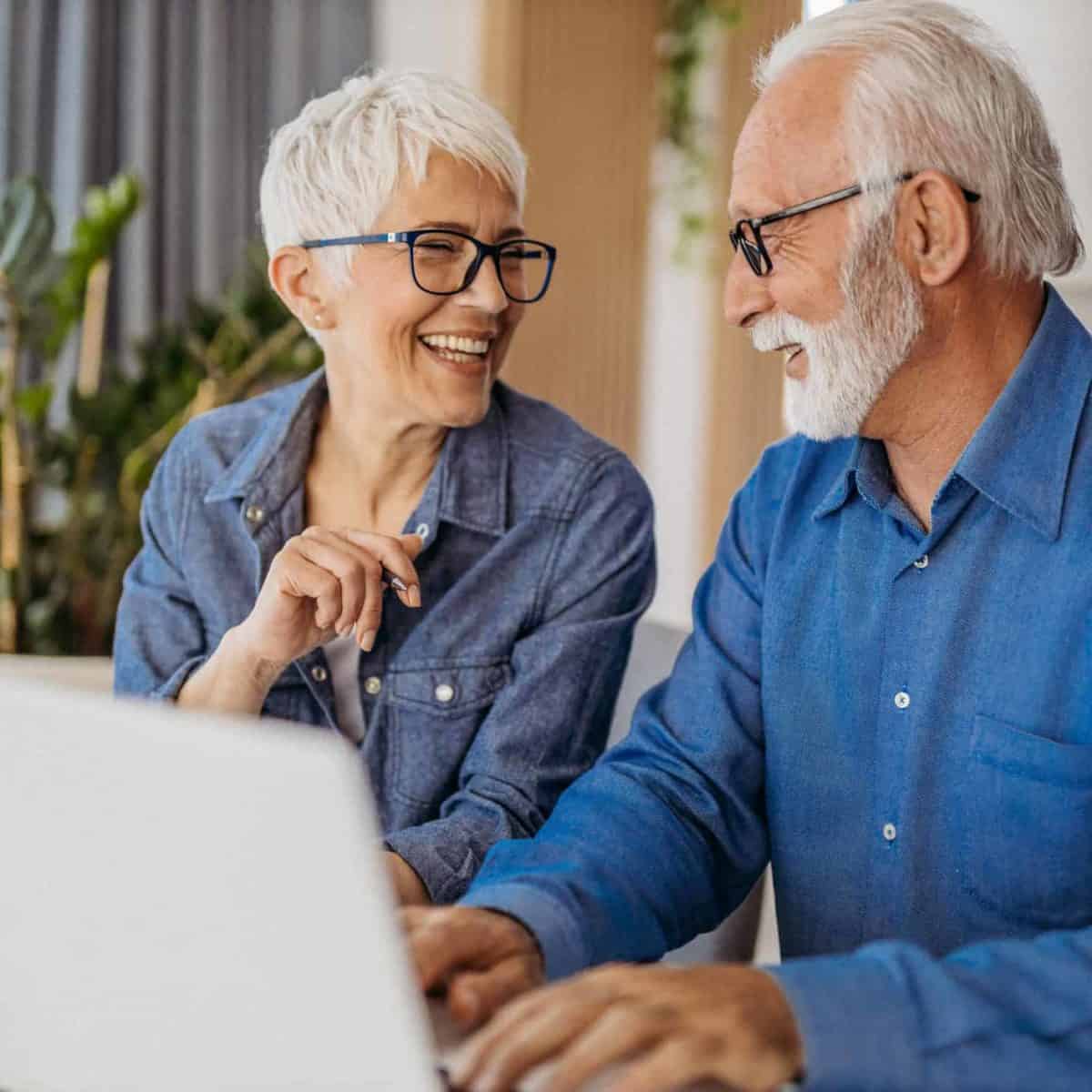 New Jersey Precious Metals IRA & Investing Company Copy of Senior couple at laptop smiling GettyImages 1323096524 1200x1200 1