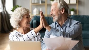 Roseland Gold IRA Investing Company a happy senior couple 300x169